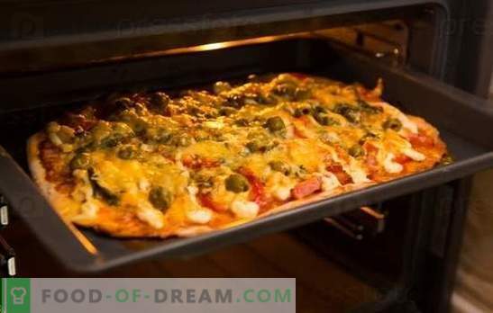 Het pizza-recept in de oven is thuis een geliefd gerecht. Pizzarecepten in de oven: met kaas, champignons, ham, zeevruchten