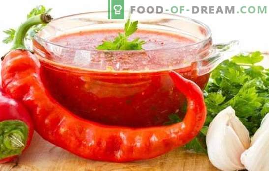 Adjika van tomaten en knoflook voor de winter: een hot topic van zelfgemaakte bereidingen. 7 beste adjika-recepten uit tomaten en knoflook voor de winter